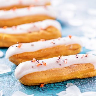 Four eclairs with sugar glaze