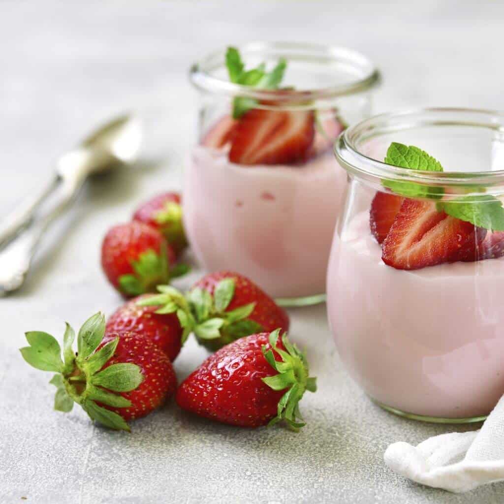 Strawberry yogurt with fresh berry and mint